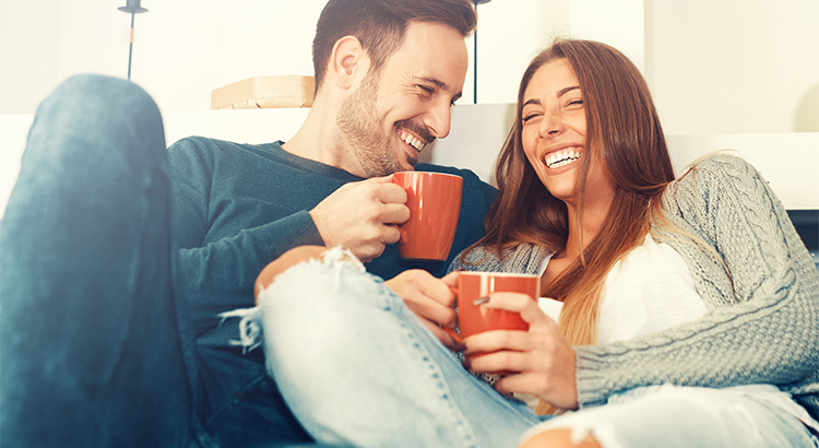 picture of st. louis millennial home buyers laughing together