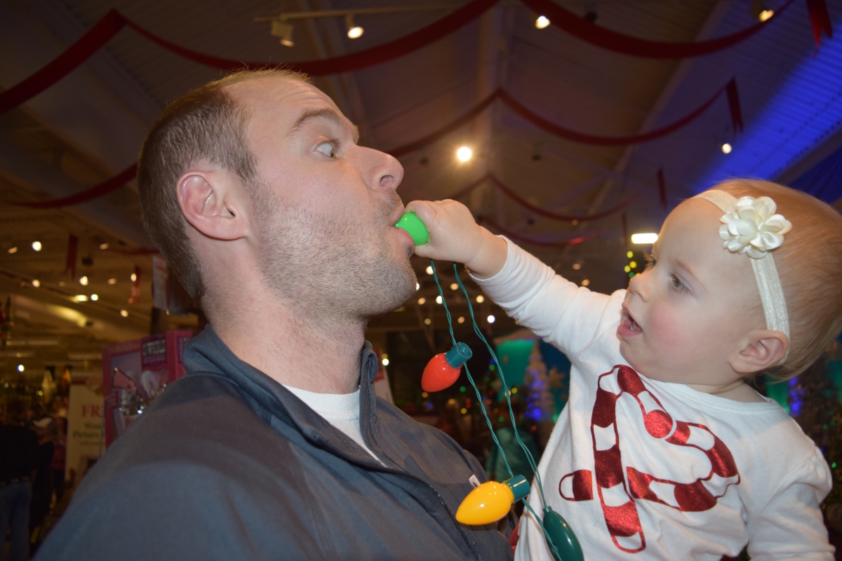 William Buscher getting light bulb shoved in his mouth by his daughter